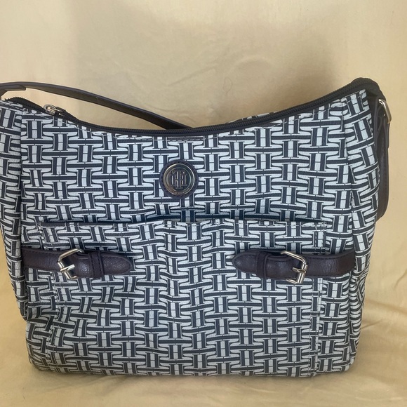 Tommy Hilfiger Handbags - Sweet Tommy Hilfiger bag. Brown and cream design. Outside pockets with buckle.